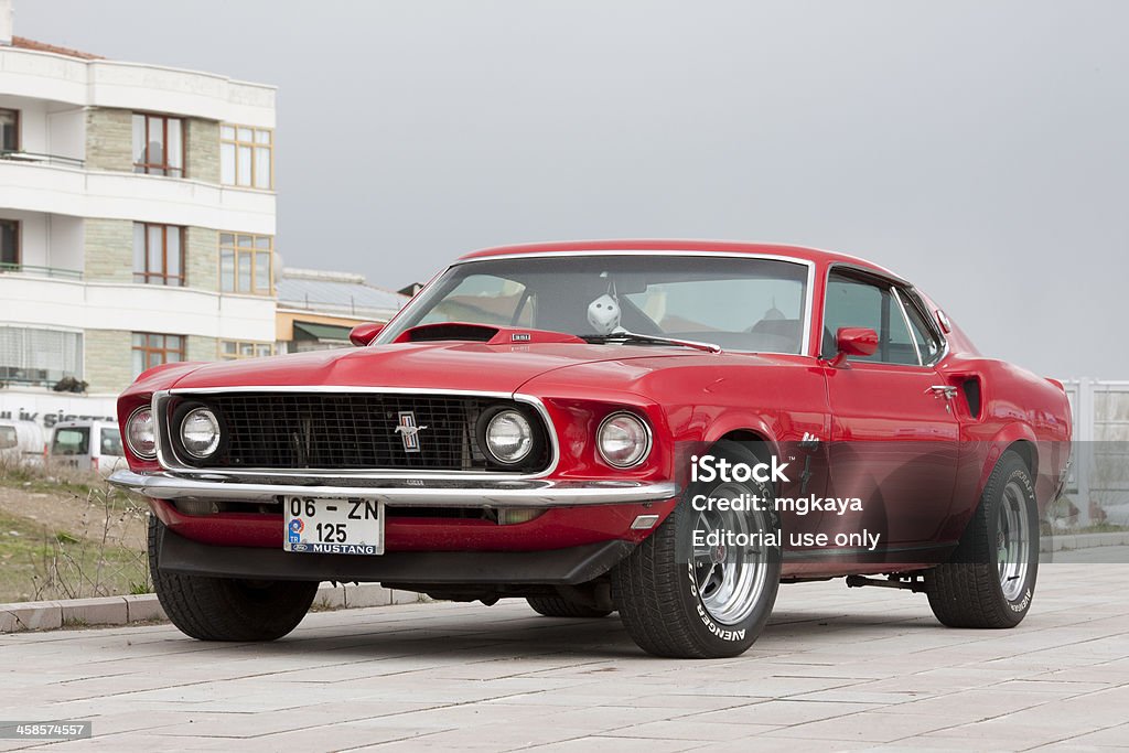 Ford Mustang Ankara, Turkey - April 19, 2011: Red Ford Mustang is parked in street. This car is first generation Mustang (1964-1973) and manufactured by the Ford Motor Company. Ford Mustang is classic and legendary muscle car and one of the favorite car of automobile enthusiasts. Many people quite likes American classic cars in Turkey and you can come across a car like this on the streets of major cities. Ford Mustang Stock Photo Ford Mustang Ankara, Turkey - April 19, 2011: Red Ford Mustang is parked in street. This car is first generation Mustang (1964-1973) and manufactured by the Ford Motor Company. Ford Mustang is classic and legendary muscle car and one of the favorite car of automobile enthusiasts. Many people quite likes American classic cars in Turkey and you can come across a car like this on the streets of major cities. Ford Mustang Stock Photo