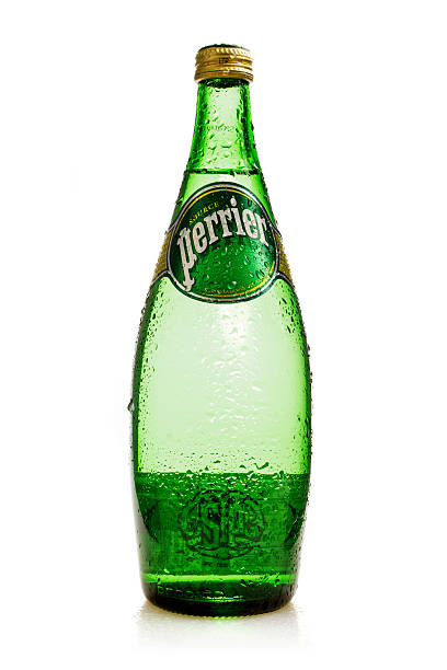 Bottle of Carbonated Natural Mineral Water Perrier stock photo