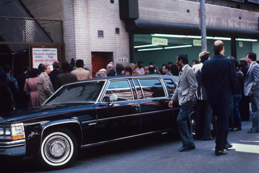 New York City, USA - November 1, 1982. A limousine arrives with Elizabeth Ashley (not pictured) , at the stage door of the music Box theater. A crowd gathers on the sidewalk on 45th Street in Manhattan to catch a glimpse of the actress as she exits the car.