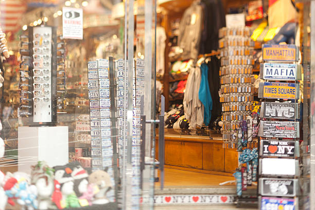 Souvenir Store New York City, USA - December 5, 2011: Souvenir store on 5th Ave and 35th Street, one city block from The Empire State Building. new york state license plate stock pictures, royalty-free photos & images