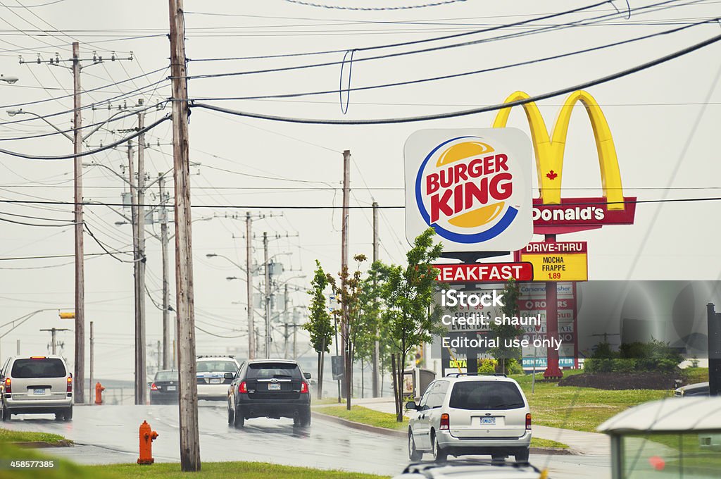Fast Food Signage Halifax, Canada - July 9, 2011: Burger King and McDonald's billboards compete for motorists attention on Chain Lake Drive in Bayers Lake Industrial Park. McDonald's Stock Photo