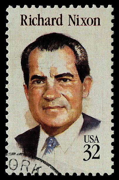 Richard Nixon stamp Beijing, China - December 2nd, 2011: US postage stamp, Richard Nixon(1913–1994),was the 37th President of the United States, serving from 1969 to 1974. 1974 photos stock pictures, royalty-free photos & images