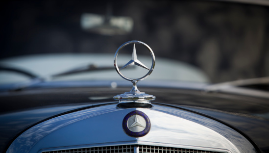 Chichester, West Sussex - September 16, 2011: Vintage Mercedes three-point star badge or marque. Mercedes-Benz is a German manufacturer of cars and other automotive vehicles. It is a division of Daimler AG. The company is based in Stuttgart, Germany.