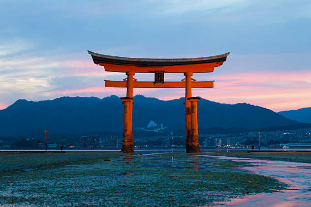 Itsukushima Shrine at low tide on Miyajima island, Japan stock photo