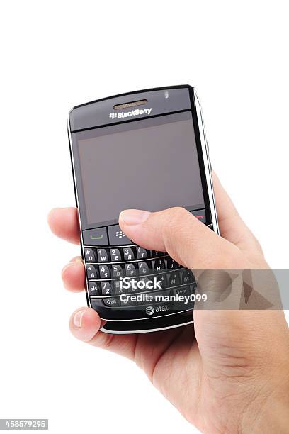Ręka Trzyma Telefon Blackberry - zdjęcia stockowe i więcej obrazów Białe tło - Białe tło, Część, Edytorski