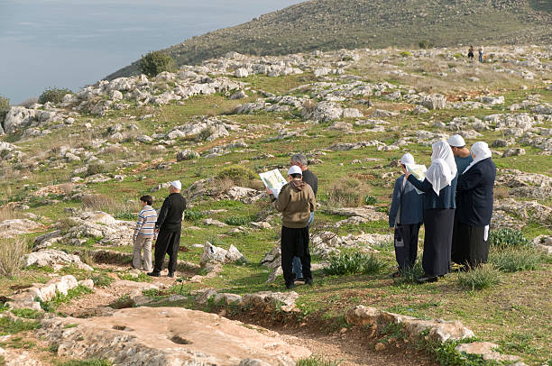 Druze family visiting the Mount Arbel near Sea of Galilee stock photo