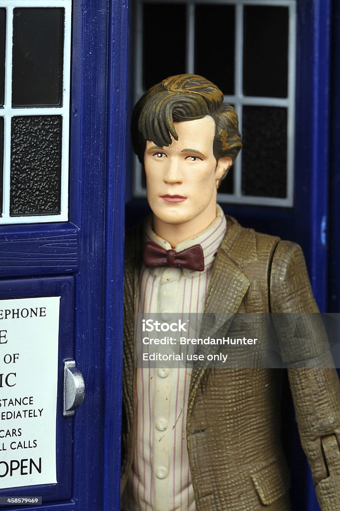 Out of the Box Vancouver, Canada - May 21, 2013: A toy of the eleventh doctor from Dr. Who, emerging from the TARDIS. The TARDIS is the Doctor's main form of travel, a time machine and spaceship that is larger on the inside. Doctor Who is created by the BBC. Alien Stock Photo