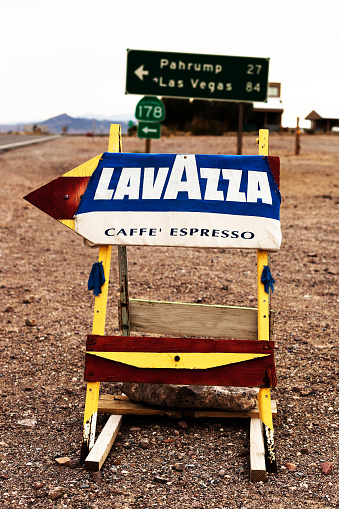 Shoshone, California, USA - March, 19 2009: a Lavazza Coffee sign located in the remote village of Shoshone, the small village famous as the southern gateway to Death Valley National Park.