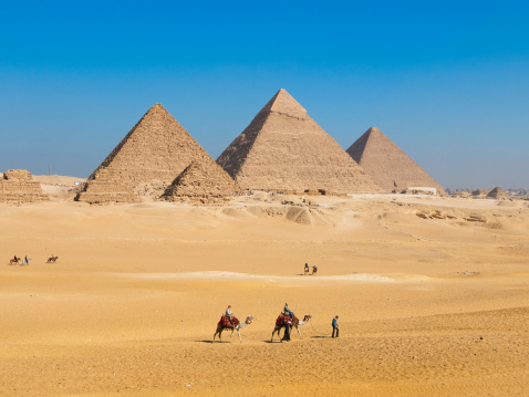 View of the great Pyramid complex of Giza, in Cairo Egypt.