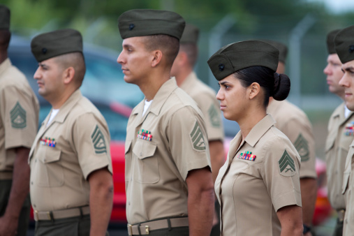 Quantico, Virginia, USA - August 5, 2011: Marines in monthly formation with select focus on the woman Marine.