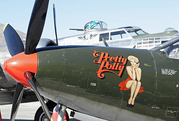 Palm Springs, United States, January 31, 2011. Restored Bell P-63 Kingcobra Pretty Polly on the tarmac at Palm Springs International Airport with a Boeing B-17G in the background.