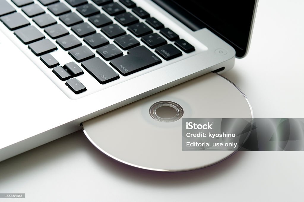 アップルマックブック - CD-ROMのロイヤリティフリーストックフォト