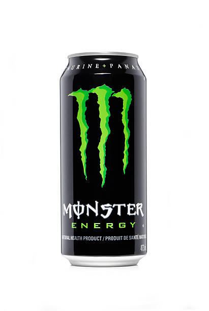 Monster energy drink Beloeil, Canada-march 23, 2011: Tall black can of Monster energy drink isolated on a white background monster energy stock pictures, royalty-free photos & images