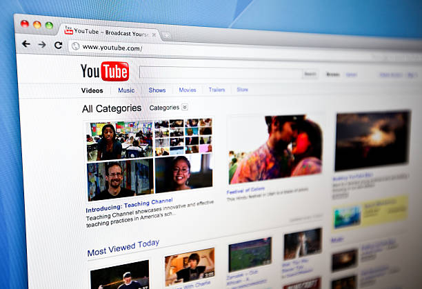 YouTube homepage. Mesa, Arizona, United States - April 4, 2011: A close up shot of the YouTube website homepage on a desktop computer screen. YouTube is the largest video sharing website in the world and recieves thousands of new video uploads daily. web browser photos stock pictures, royalty-free photos & images