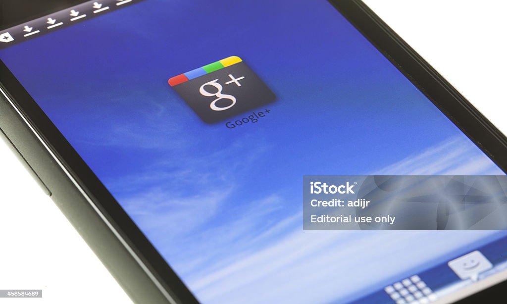 Google Plus no dispositivo móvel - Foto de stock de Computador royalty-free