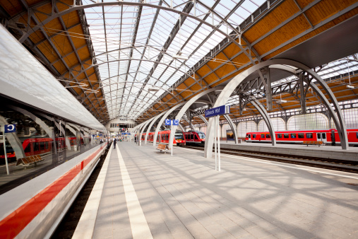 Lubeck, Germany - July 6, 2011: ICE TD class train waits at the Lubeck main train station en route between Berlin and Copenhagen. This train is a diesel variant of the ICE trains and completes part of its journey on board a ferry between Germany and Denmark. Other Deutsche Bahn Regio type trains can be seen at the station.