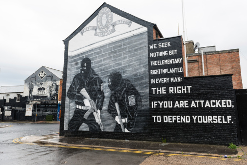 Belfast, Northern Ireland - May 8, 2012: One of the famous political murals in Belfast, Northern Ireland.  There have been nearly 2000 murals documented in Northern Ireland since the 1970s, mostly depicting the region's past and present political and religious divisions, or other aspects of Irish history or culture.