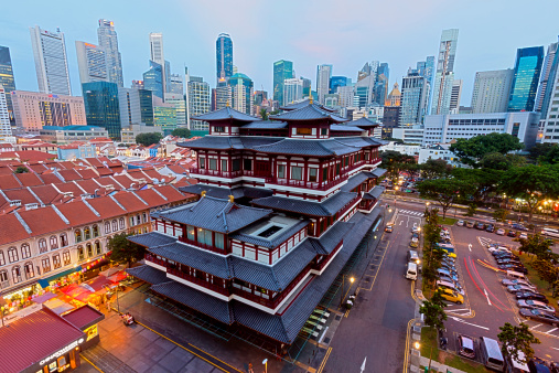 Singapore, Singapore - October 11, 2013: Chinatown, the Buddha Tooth Relic temple and museum. The Buddha Tooth Relic Temple and Museum is a Buddhist temple and museum complex located in the Chinatown district of Singapore.