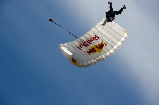 Ottawa, Canada - July 27, 2013: Skydiver with Deployed Parachute at the Ottawa 2013 Red Bull Flugtag Competition