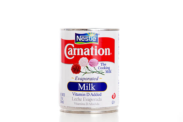 Nestle Oeillet giroflée Evaporated lait Leche bouillant Evaporada - Photo