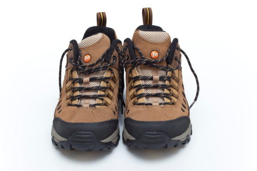 Trebnje, Slovenia, - November 01, 2011: Merrell hiking shoes.Merrell is a footwear company founded by Clark Matis, Randy Merrell, and John Schweitzer in 1981 as a maker of high-performance hiking boots. Since 1997 the company has been a wholly owned subsidiary of shoe industry giant Wolverine World Wide. The company recorded total sales of footwear and clothing totaling nearly $500 million in 2010.Studio shot.