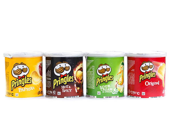 Four Pringles Boxes on White Izmir, Turkey - July 13, 2011: Four Pringles boxes isolated on white. Pringles is a brand of potato and wheat based snacks originally developed by Procter &amp; Gamble and sold in over 140 countries Pringles stock pictures, royalty-free photos & images