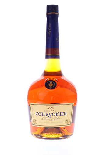 Izmir, Turkey - April 15, 2011: A 1L bottle of Courvoisier Cognac shot in studio isolated on white. Courvoisier is a French cognac brand.