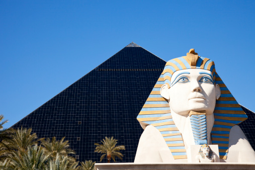 Las Vegas, Nevada, USA - February 22, 2011: Replica of Great Sphinx and Pyramid of Giza of the Luxor hotel and casino on Las Vegas strip. Luxor is located at the south end of The Strip. The hotel features Egyptian motif throughout.