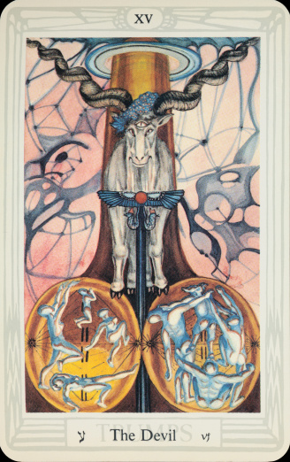 Glasgow, UK - August 10, 2011: Trump card number XV from Aleister Crowley's Thoth Tarot card deck - The Devil. Crowley designed the cards which were then painted by Lady Frieda Harris between 1938 and 1943 but not published until 1969. In Crowley's explanation, this card signifies materiality, temptation and obsession.