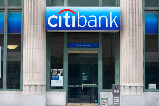 San Francisco, California - April 24, 2011: The Citibank logo above the front door entrance to a bank branch, located in the San Francisco Financial District.  Citibank is a subsidiary of Citigroup, based in New York City.