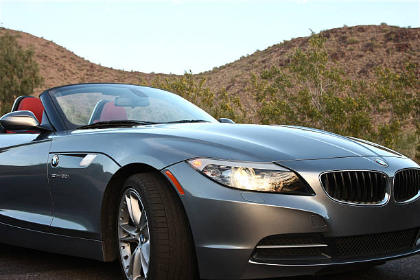 Scottsdale, Arizona, USA - April 11, 2011: A BMW Z4 roadster convertible sits parked against a desert background during the late day.
