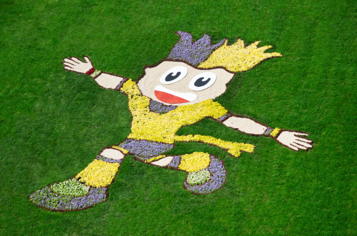 Kiev, Ukraine - June 7, 2012: Flowerbed is prepared in Kiev depicting mascot of Euro 2012 Slavko