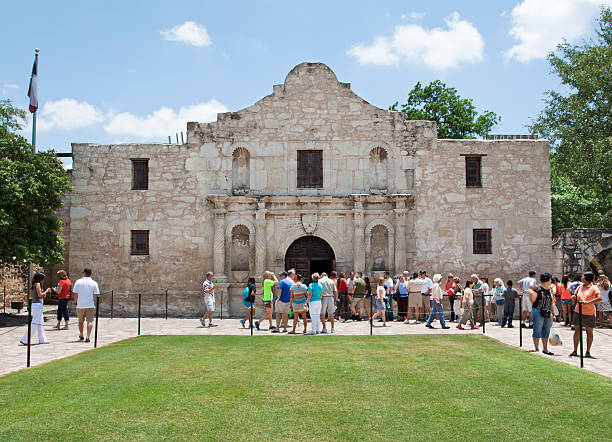 The Alamo Mission and Tourists stock photo