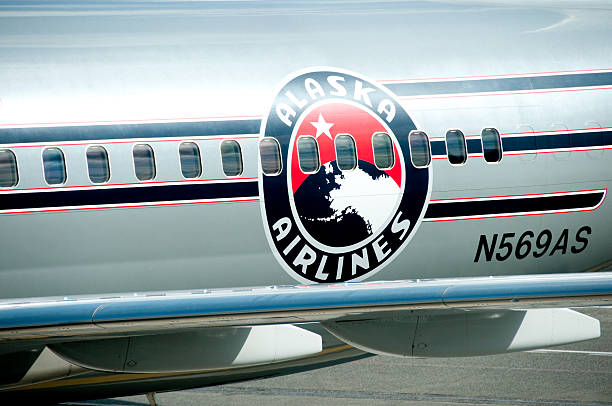 Seattle, USA - April 28, 2012: Alaska Airlines jet sitting at the Seattle Tacoma Airport D Concourse with the 75th anniversary paint job.