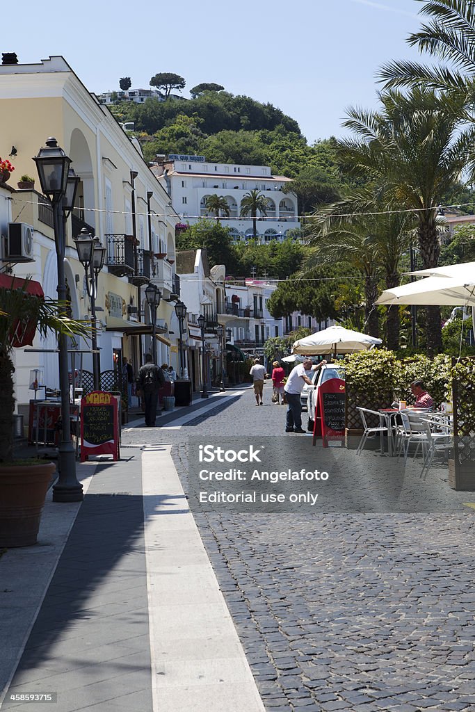 Ischia Island Street Ischia, Italy  - May 24, 2012: Ischia Island Street in Casamicciola, restaurants, markets and people walking in the street at morning, photo taken in Casamicciola Terme, Ischia, Italy. Beauty In Nature Stock Photo