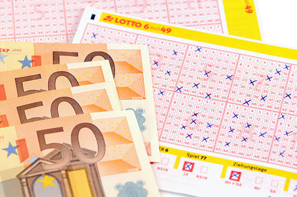 German Lottery Ticket and four 50 euro banknotes stock photo
