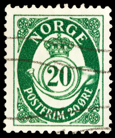 British One and a Half Pence Green Used Postage Stamp showing Portrait of King George VI, printed and issued from 1950 to 1952