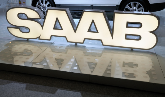 Amsterdam, The Netherlands - April 12, 2011:  Saab logo lights on display at the 2011 Amsterdam AutoRAI motorshow. The 2011 Amsterdam motorshow was running from April 12 until April 23, in the RAI event center in Amsterdam, The Netherlands.