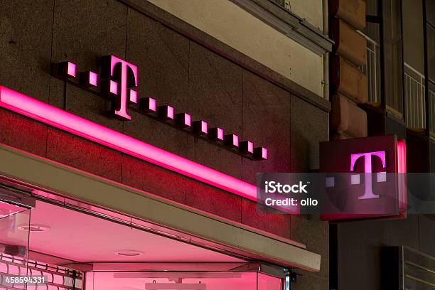 Red Illuminated Sign Of Telekom Shop Stock Photo - Download Image Now - Deutsche Telekom, Business, Capital Cities