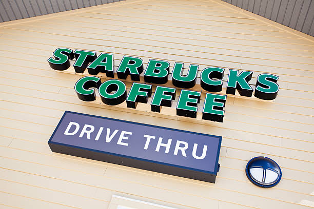 Halifax, Nova Scotia, Canada - September 10, 2011: Starbucks Coffee Drive Thru Signage.  Starbucks is the largest coffeehouse company in the world with over 17,000 locations in 50 different countries (as of 2011) Starbucks is based in Seattle, Washington.