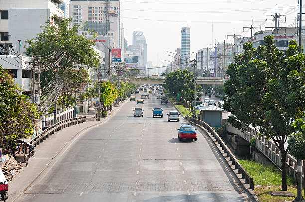 Bangkok, Thailand - November 29, 2010: A cityscape of traffic on Ratchadapisek road in Bangkok, Thailand.