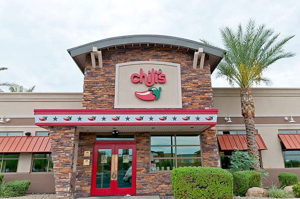 Chili's Casual Dining Restaurant  Store Front with Palm Tree stock photo