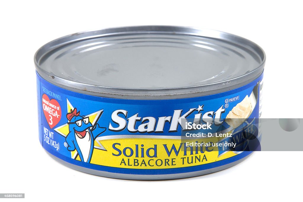 StarKist Tuna Can "Nashville, Tennessee, USA - February, 22th 2011: A single StarKist Solid Albacore White Tuna can by itself isolated on a white background." Tuna - Seafood Stock Photo