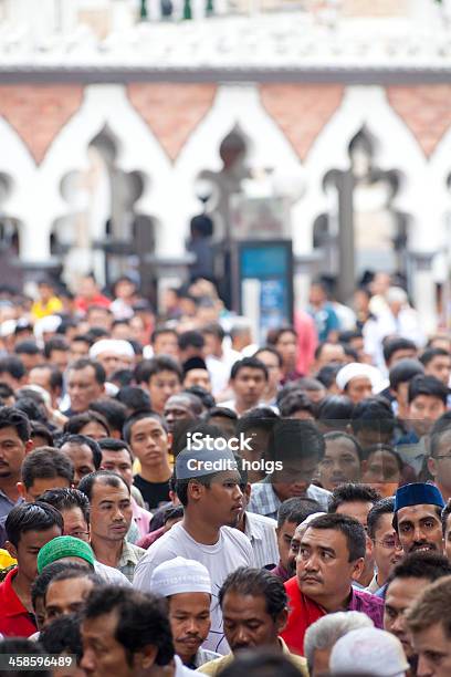 Crowd Of Men Exits Masjid Jamek Mosque Kuala Lumpur Stock Photo - Download Image Now