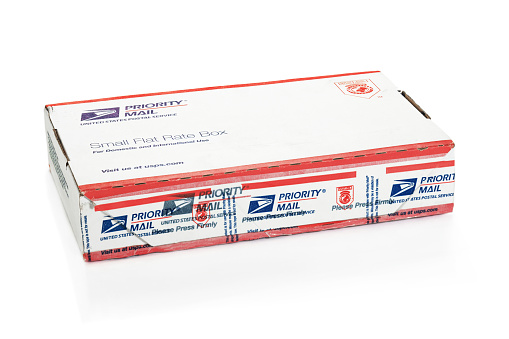 Dublin, Ireland - March 12, 2011: USPS Small Parcel delivered to ireland. If your mailpiece isn’t a postcard, letter, or a flat, then it’s a parcel. You may be surprised to find out that 