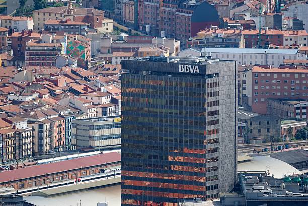 Bilbao, Spain - July 26, 2008: View of the BBVA tower in Bilbao. This modern skyscraper is the BBVA bank\\'s headquarters in Bilbao. It stands out over the rest of the urban landscape of Bilbao (Spain).
