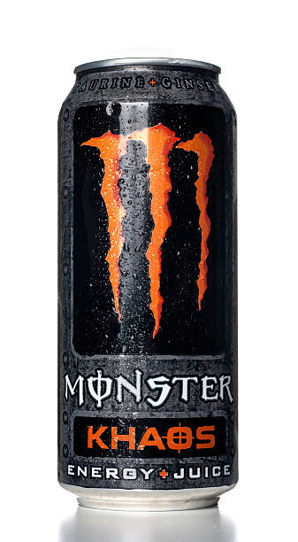 Monster Khaos Energy Drink can with water drops Miami, USA - April 7, 2012: Monster Khaos Energy Drink 16 OZ can with water drops. Monster energy drink brand is owned by Monster Beverage Company. monster energy stock pictures, royalty-free photos & images