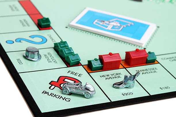 monopólio tabuleiro de jogo, que mostra o livre praça do parque de estacionamento - monopoly board game part of leisure games play imagens e fotografias de stock