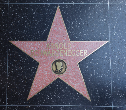Los Angeles, USA - August 18, 2011:  The Hollywood Walk of Fame star of Arnold Schwarzenegger located on Hollywood Blvd. that was awarded in 1987 for achievement in motion pictures.