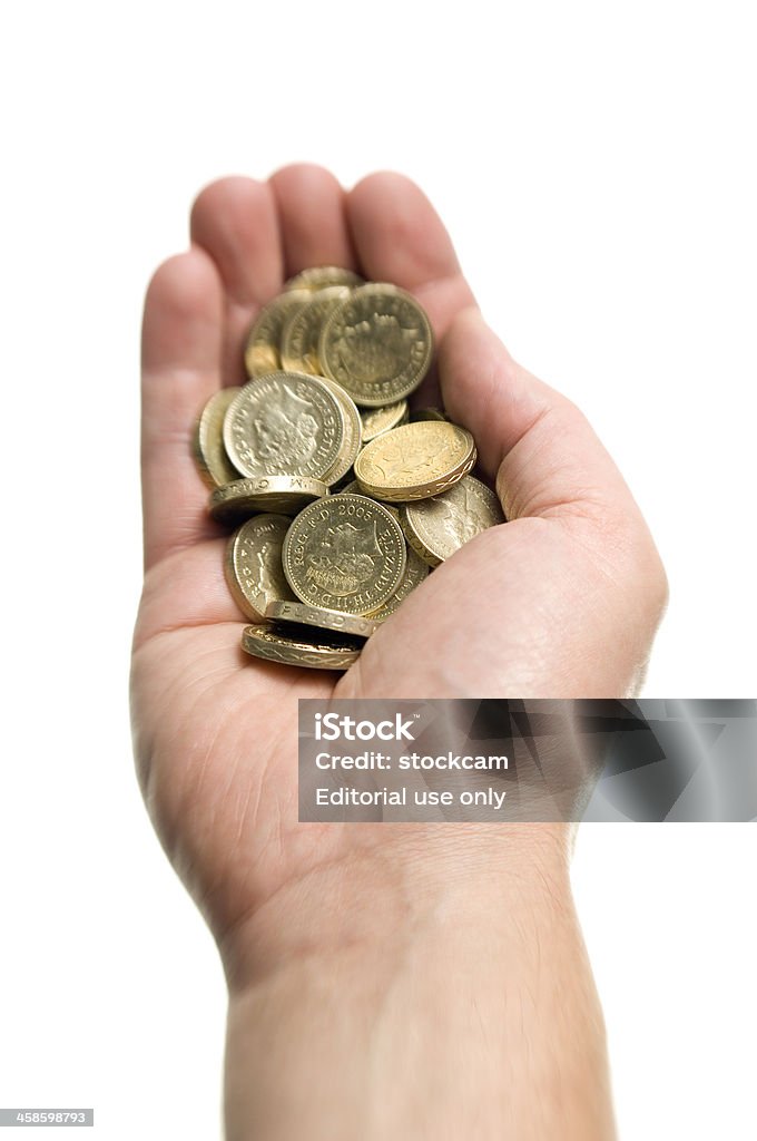 손으로 쥠 파운드 동전 - 로열티 프리 1 파운드 동전 스톡 사진